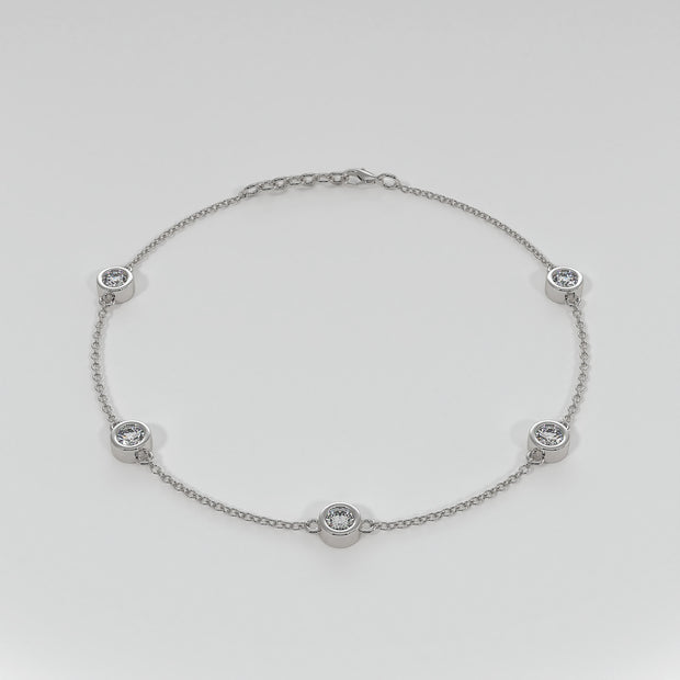 Spaced Diamond Bracelet With Five Diamonds In Rub Over Setting In White Gold Designed by FANCI Bespoke Fine Jewellery