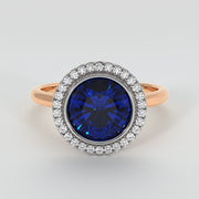 Tanzanite Engagement Ring With Halo Of Diamonds - from £1795
