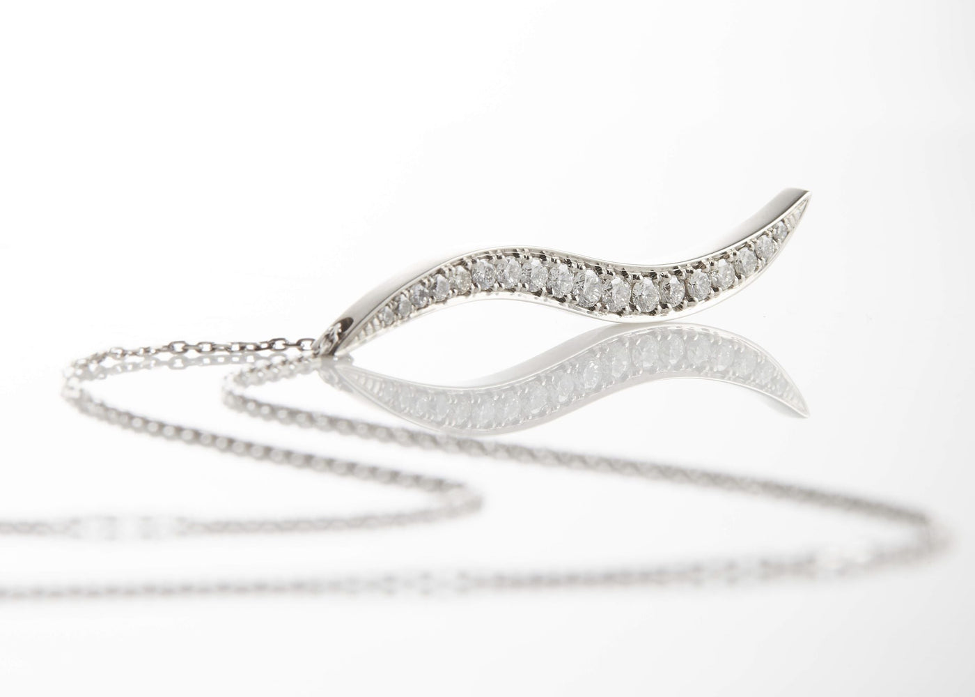 Diamond Wave Pendant In White Gold Designed by FANCI Bespoke Fine Jewellery