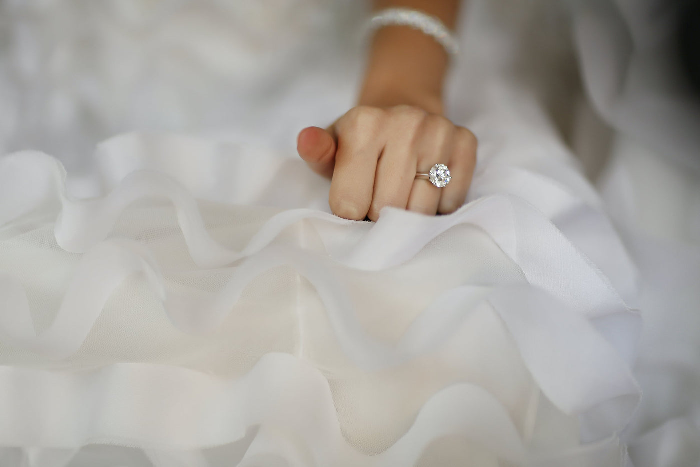 Diamond Engagement Ring On Bride's Finger Designed by FANCI Bespoke Fine Jewellery
