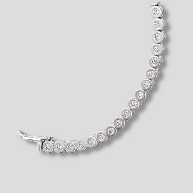 2.00ct Round Brilliant Cut Diamond Rub Over Setting Tennis Bracelet Available From FANCI Fine Jewellery, Southampton, UK.