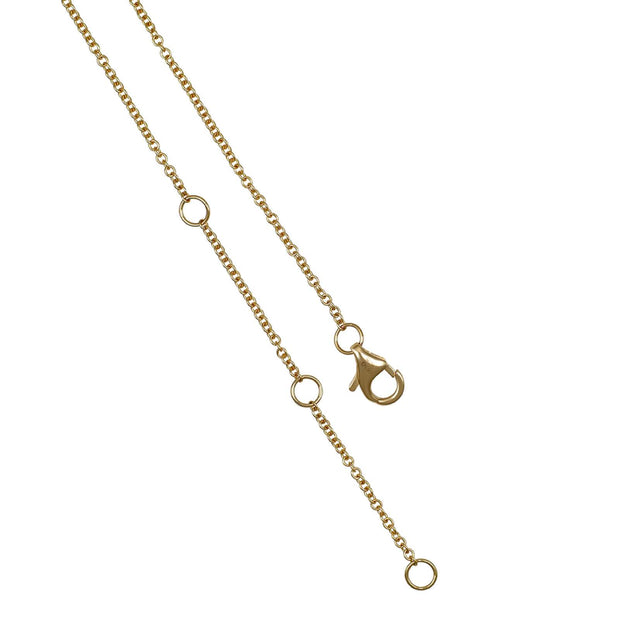 Gold chain necklace with clasp on a white background