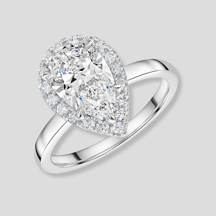 Talon Set Lab Grown Pear Shape Diamond Halo Ring In White Gold By FANCI Fine Jewellery, Southampton, UK.