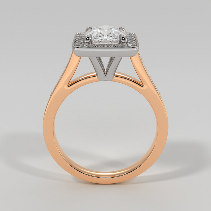 High Halo Engagement Ring With Cushion Cut Centre Diamond Diamond Set Shoulders In Rose Gold. Designed And Manufactured By FANCI Fine Jewellery, Southampton, UK.