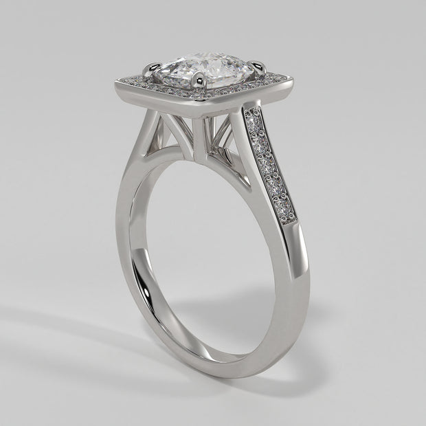 High Halo Engagement Ring With Cushion Cut Centre Diamond Diamond Set Shoulders In White Gold. Designed And Manufactured By FANCI Fine Jewellery, Southampton, UK.
