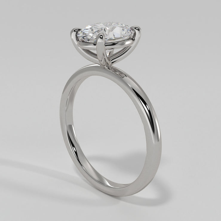 Oval Diamond Engagement Ring Set On White Gold Band. Designed And Manufactured By FANCI Fine Jewellery, Southampton, UK.