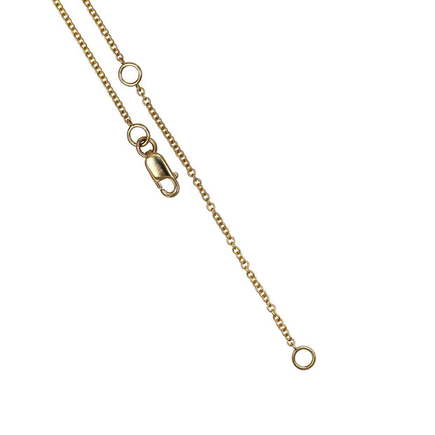 Gold chain necklace with clasp with adjustable loop for altering chain length on a white background