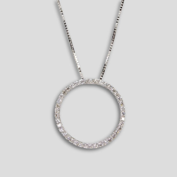 Open circle diamond pendant in 18ct white gold featuring 0.77 carats of round brilliant-cut diamonds – elegant and timeless jewellery by FANCI Southampton.