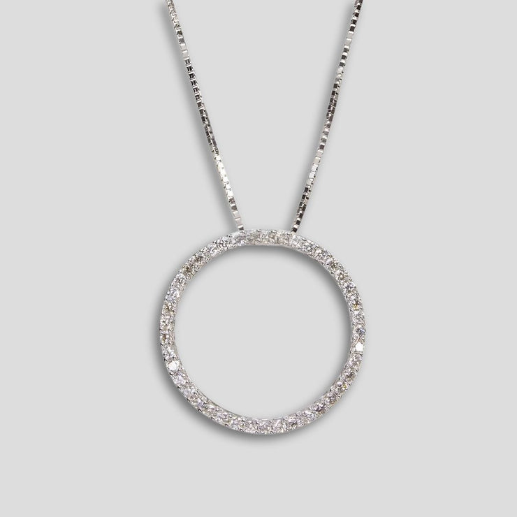 Open circle diamond pendant in 18ct white gold featuring 0.77 carats of round brilliant-cut diamonds – elegant and timeless jewellery by FANCI Southampton.