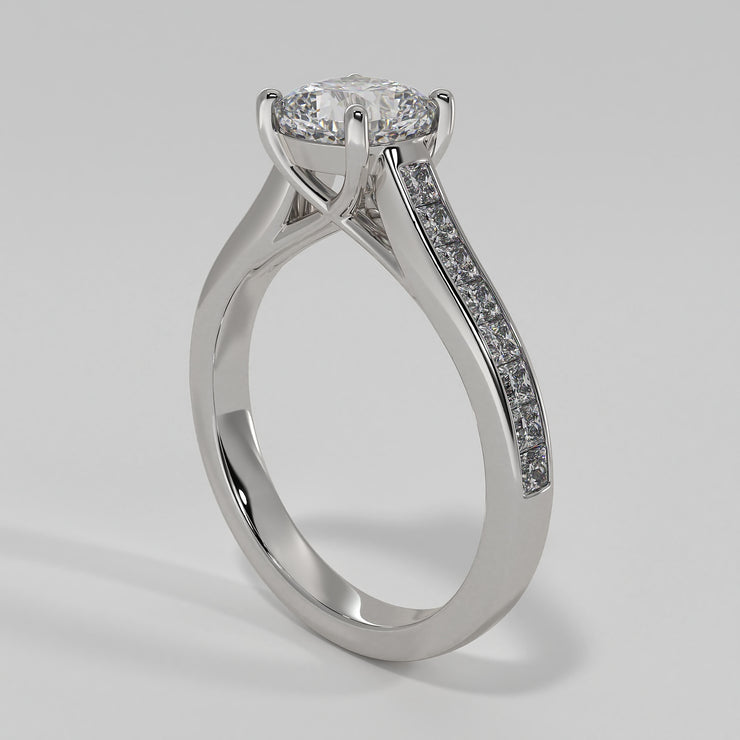Cushion Cut Diamond Engagement Ring Set In White Gold With Princess Cut Diamond Shoulders In A Channel Setting Designed And Manufactured By FANCI Bespoke Fine Jewellery