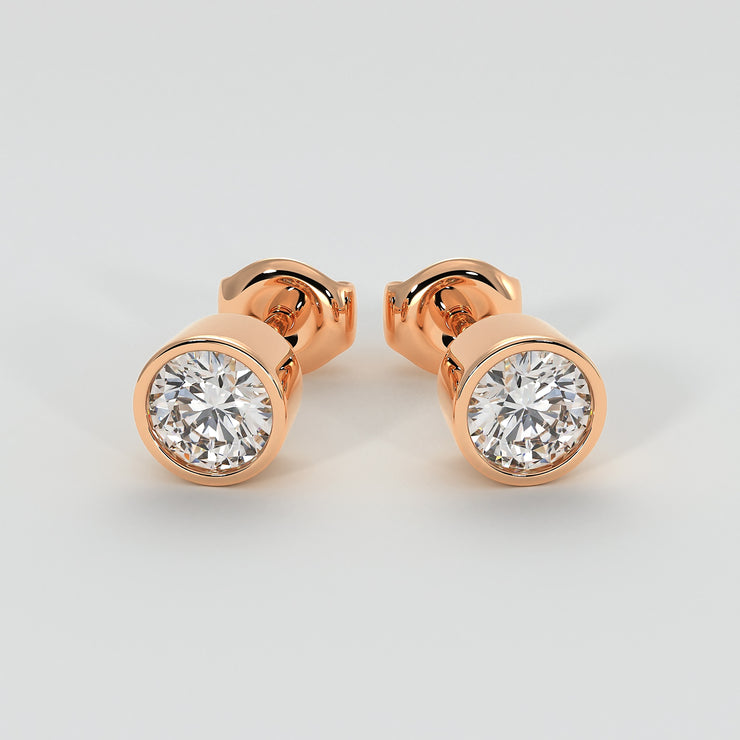 Diamond Stud Earrings In Rub Over Setting