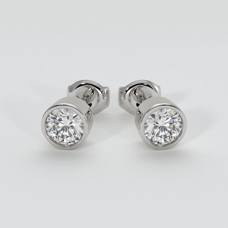 Diamond Stud Earrings In Rub Over Setting