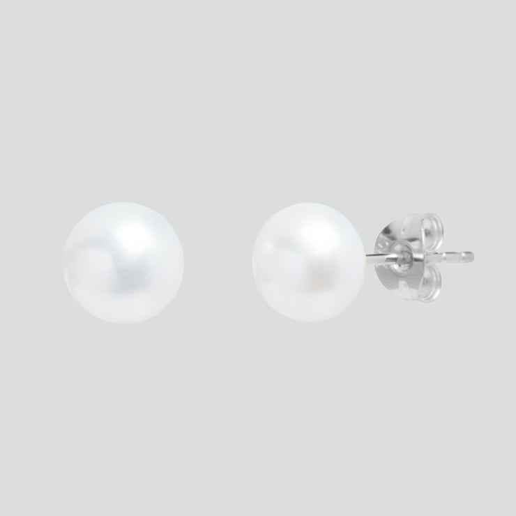 White 7-8mm button shape cultured river pearl earring studs on 9ct white gold by FANCI bespoke fine jewellery