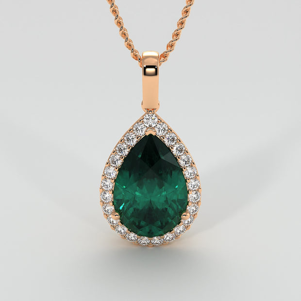 Ornate Emerald Pear Pendant With Diamond Halo