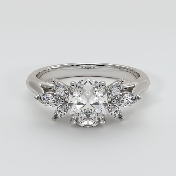 Floral Design Engagement Ring With Oval Centre Diamond And Marquise Shape Diamond Petals Set On A White Gold Band Designed And Manufactured By FANCI Bespoke Fine Jewellery