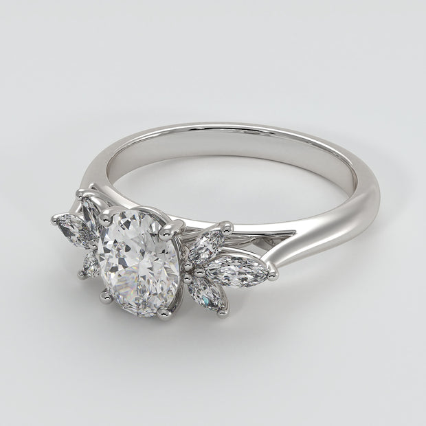 Floral Design Engagement Ring With Oval Centre Diamond And Marquise Shape Diamond Petals Set On A White Gold Band Designed And Manufactured By FANCI Bespoke Fine Jewellery