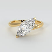 Marquise Diamond Solitaire Twist Engagement Ring In Yellow Gold Designed by FANCI Bespoke Fine Jewellery