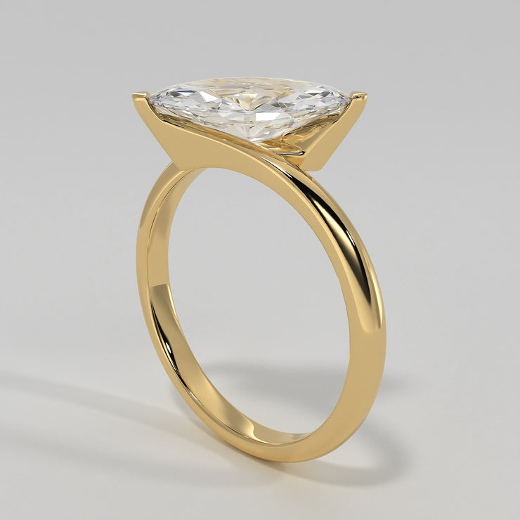 Marquise Diamond Solitaire Twist Engagement Ring In Yellow Gold Designed by FANCI Bespoke Fine Jewellery