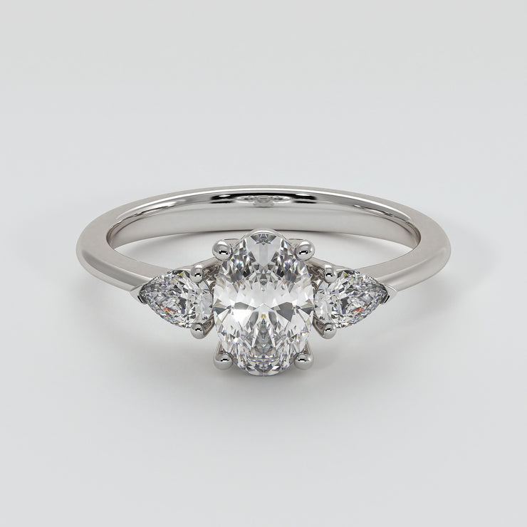 Oval And Pear Diamonds Trilogy Engagement Ring