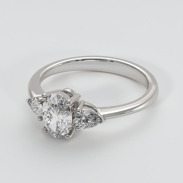 Oval And Pear Diamonds Trilogy Engagement Ring In White Gold Designed by FANCI Bespoke Fine Jewellery