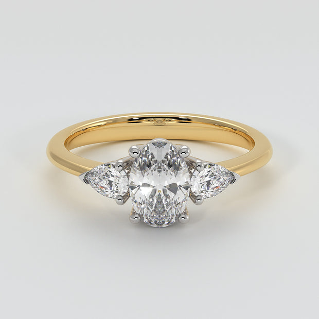 Oval And Pear Diamonds Trilogy Engagement Ring In Yellow Gold Designed by FANCI Bespoke Fine Jewellery