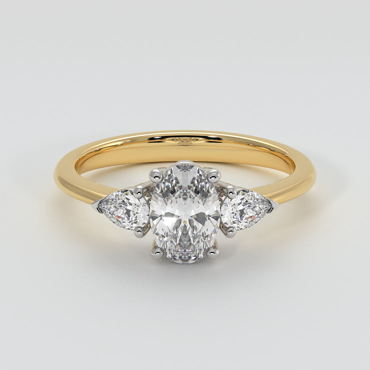 Oval And Pear Diamonds Trilogy Engagement Ring In Yellow Gold Designed by FANCI Bespoke Fine Jewellery