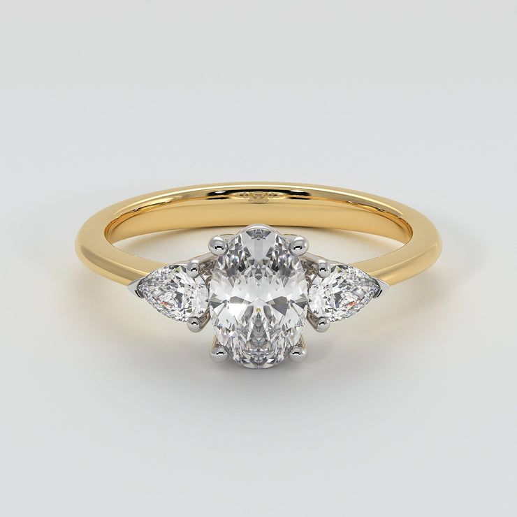 Oval And Pear Diamonds Trilogy Engagement Ring