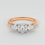 Pear And Round Diamond Trilogy Engagement Ring
