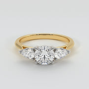 Pear And Round Diamonds Trilogy Engagement Ring In Yellow Gold Designed by FANCI Bespoke Fine Jewellery