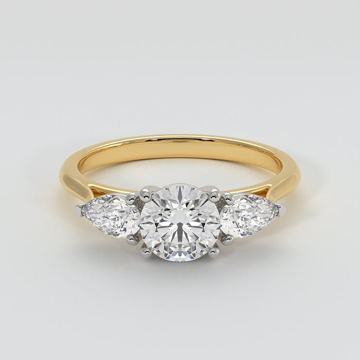 Pear And Round Diamonds Trilogy Engagement Ring In Yellow Gold Designed by FANCI Bespoke Fine Jewellery