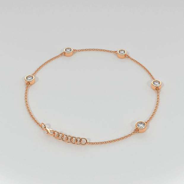 Spaced Diamond Bracelet With Five Diamonds In Rub Over Setting In Rose Gold Designed by FANCI Bespoke Fine Jewellery