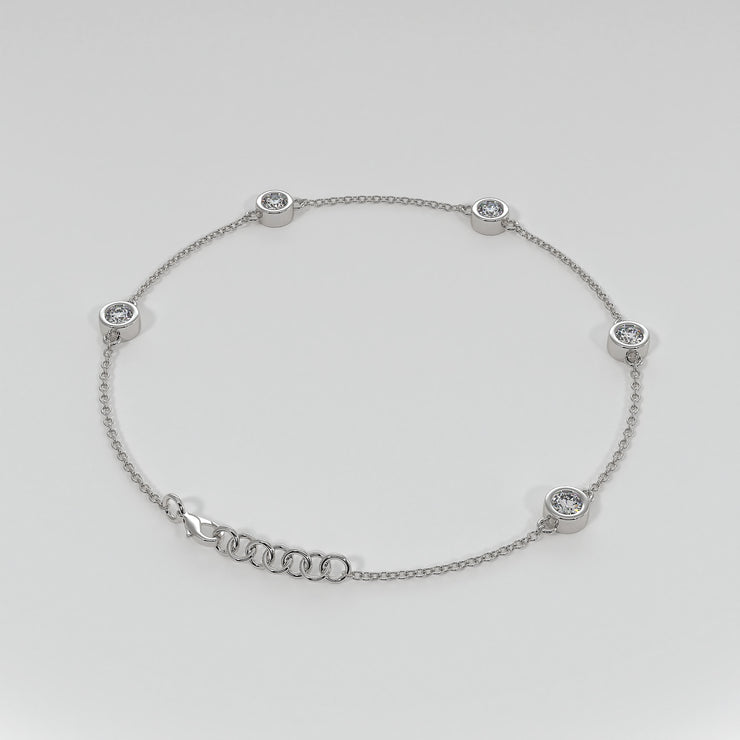 Spaced Diamond Bracelet With Five Diamonds In Rub Over Setting In White Gold Designed by FANCI Bespoke Fine Jewellery