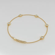 Spaced Diamond Bracelet With Five Diamonds In Rub Over Setting In Yellow Gold Designed by FANCI Bespoke Fine Jewellery