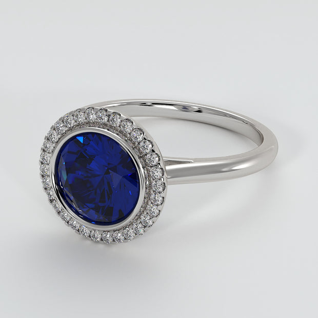 Tanzanite Engagement Ring With Halo Of Diamonds In White Gold Designed by FANCI Bespoke Fine Jewellery