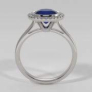 Tanzanite Engagement Ring With Halo Of Diamonds In White Gold Designed by FANCI Bespoke Fine Jewellery