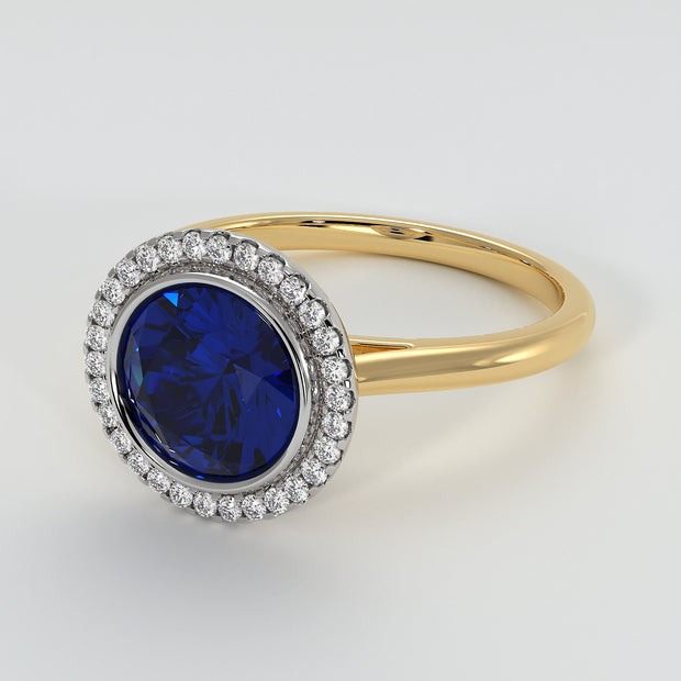 Tanzanite Engagement Ring With Halo Of Diamonds In Yellow Gold Designed by FANCI Bespoke Fine Jewellery